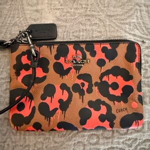 Coach Wild Print Wristlet in Orange and Black